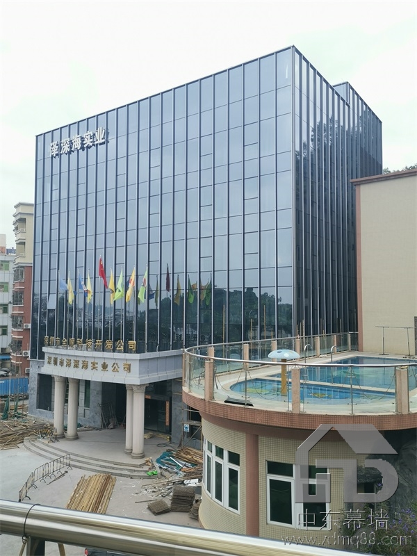 為什么現代建筑用玻璃幕墻